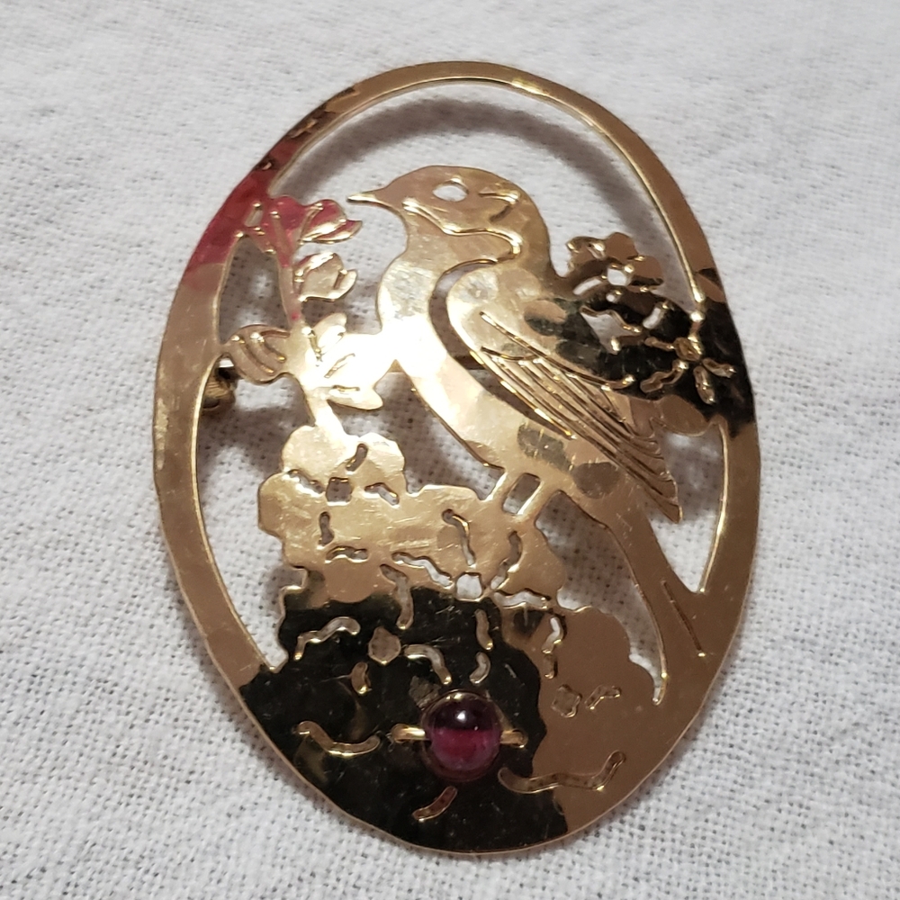 Vintage Wild Bryde Goldtone Bird on a floral Branch And red stone on the bottom